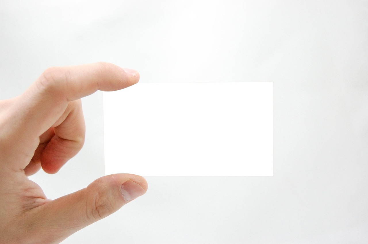 Business card, business, hand — Earning Extra: The Financial Perks of Working Part-Time at an Entertainment Bar